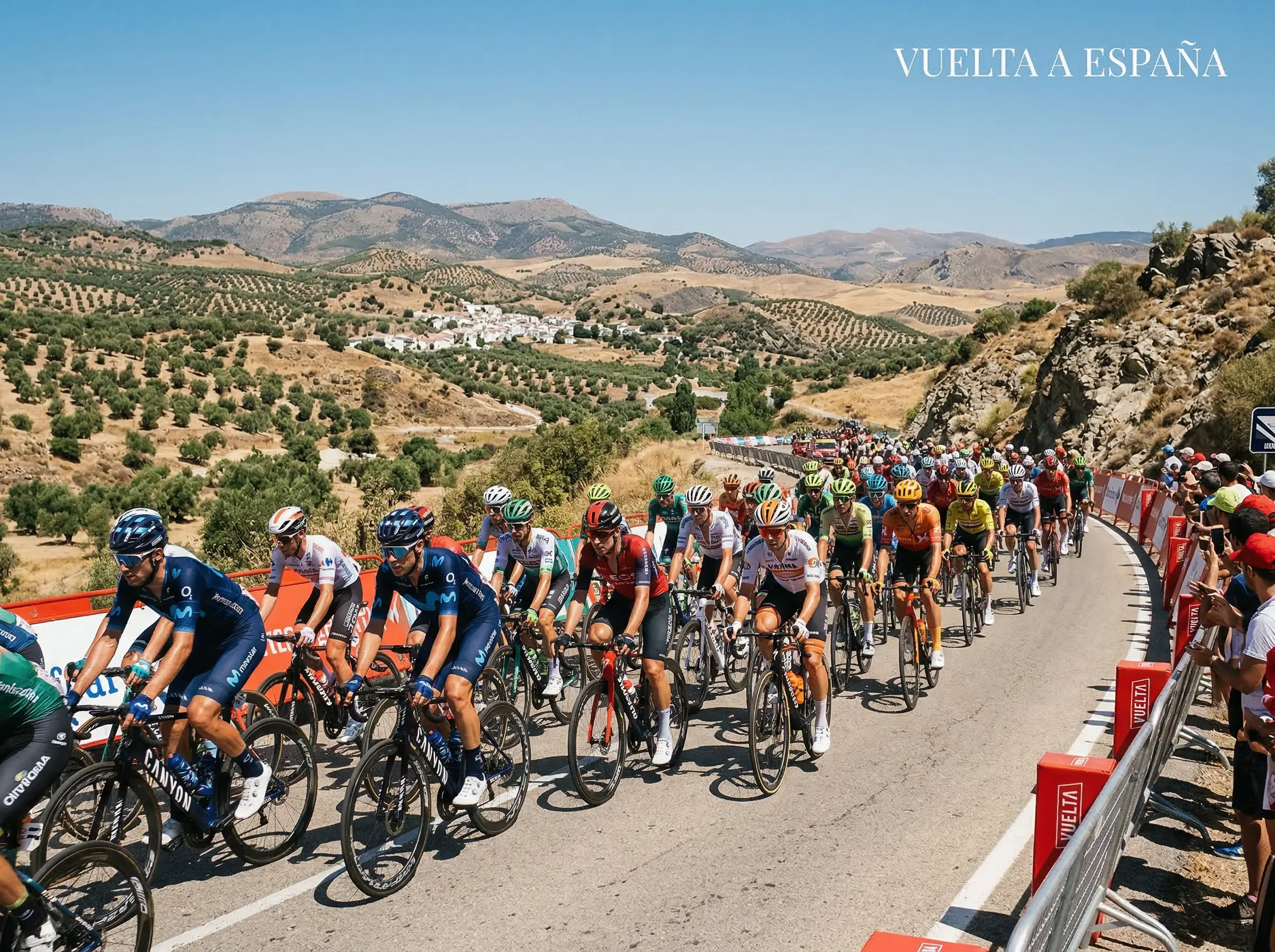 Pelotón de la Vuelta a España recorriendo una carretera entre paisajes áridos españoles
